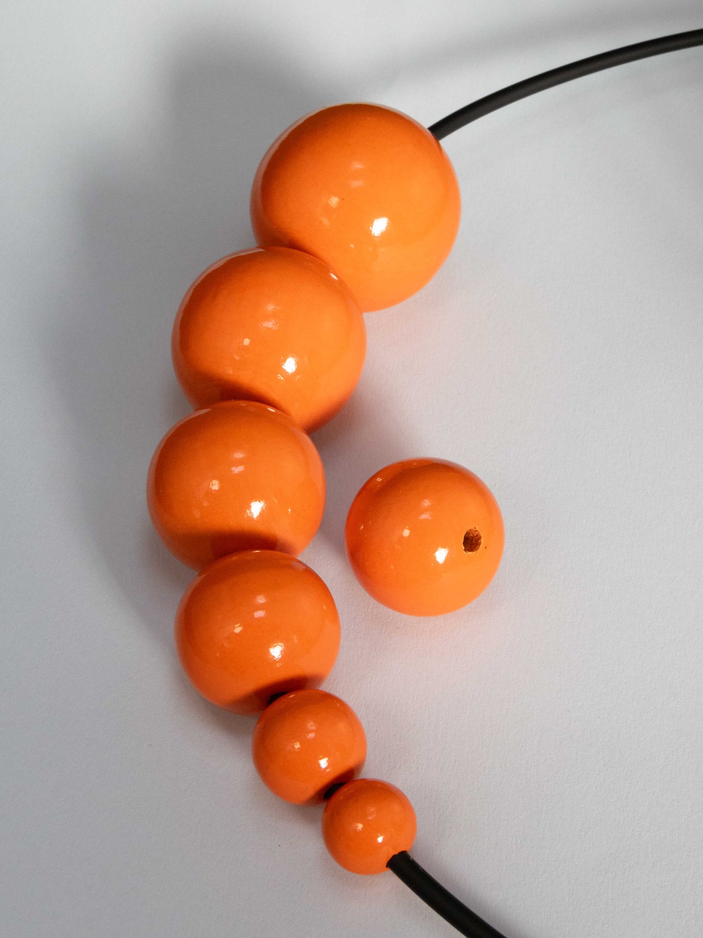 Perlina di legno arancione