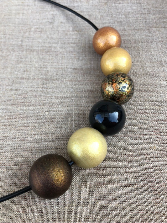 Set di perline di legno dorate e marroni antiche