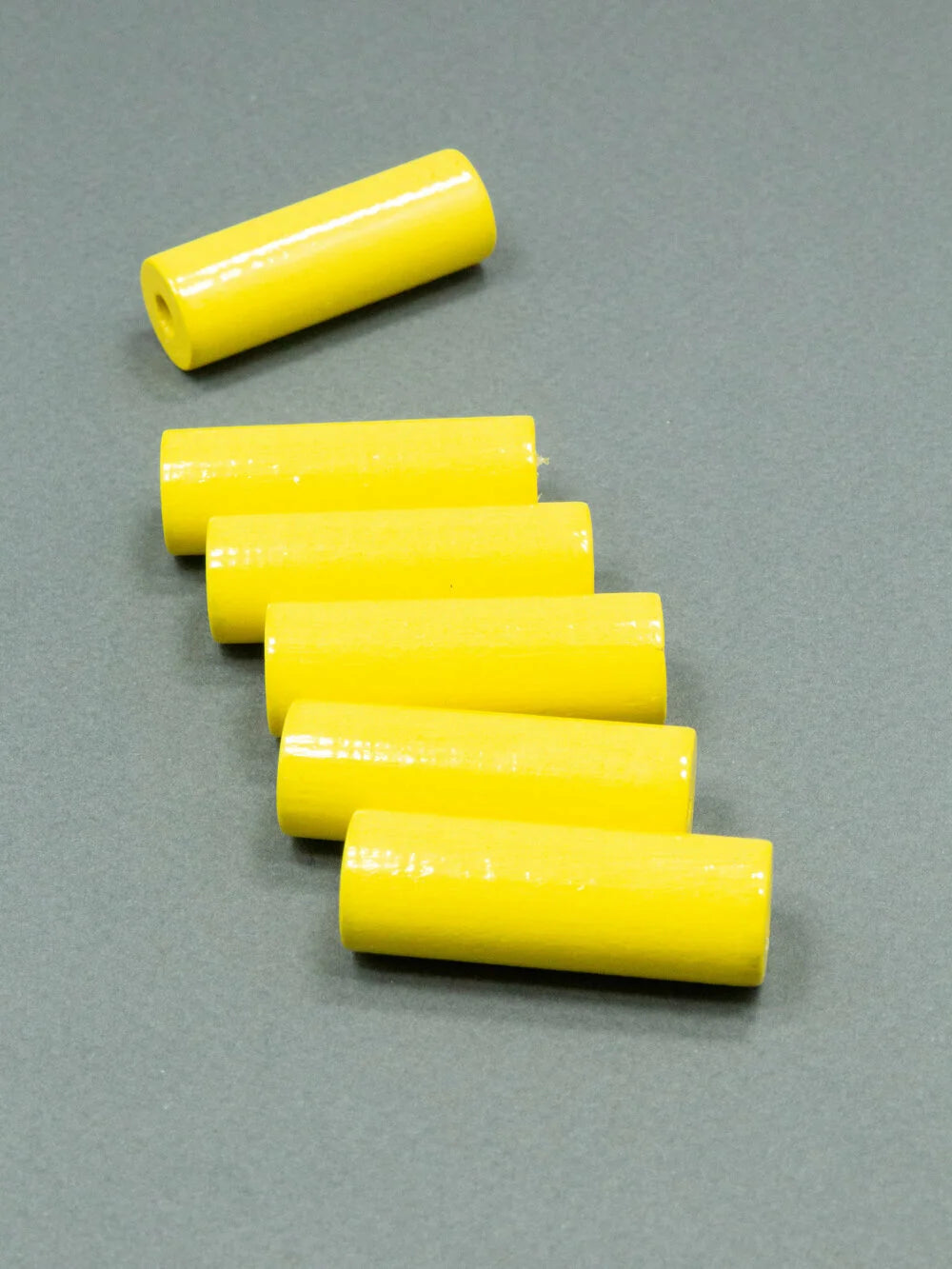 Perline di legno giallo limone a forma di cilindro