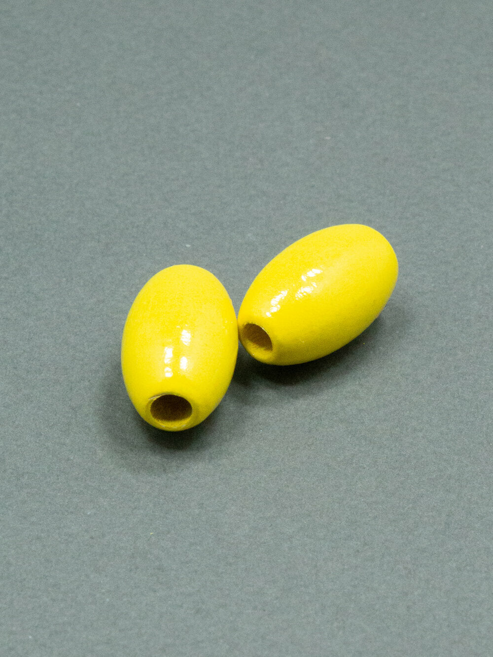 Perlina di legno giallo limone a forma di fagiolo