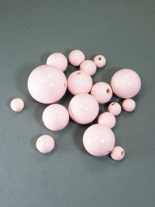 Perlina di legno rosa chiaro