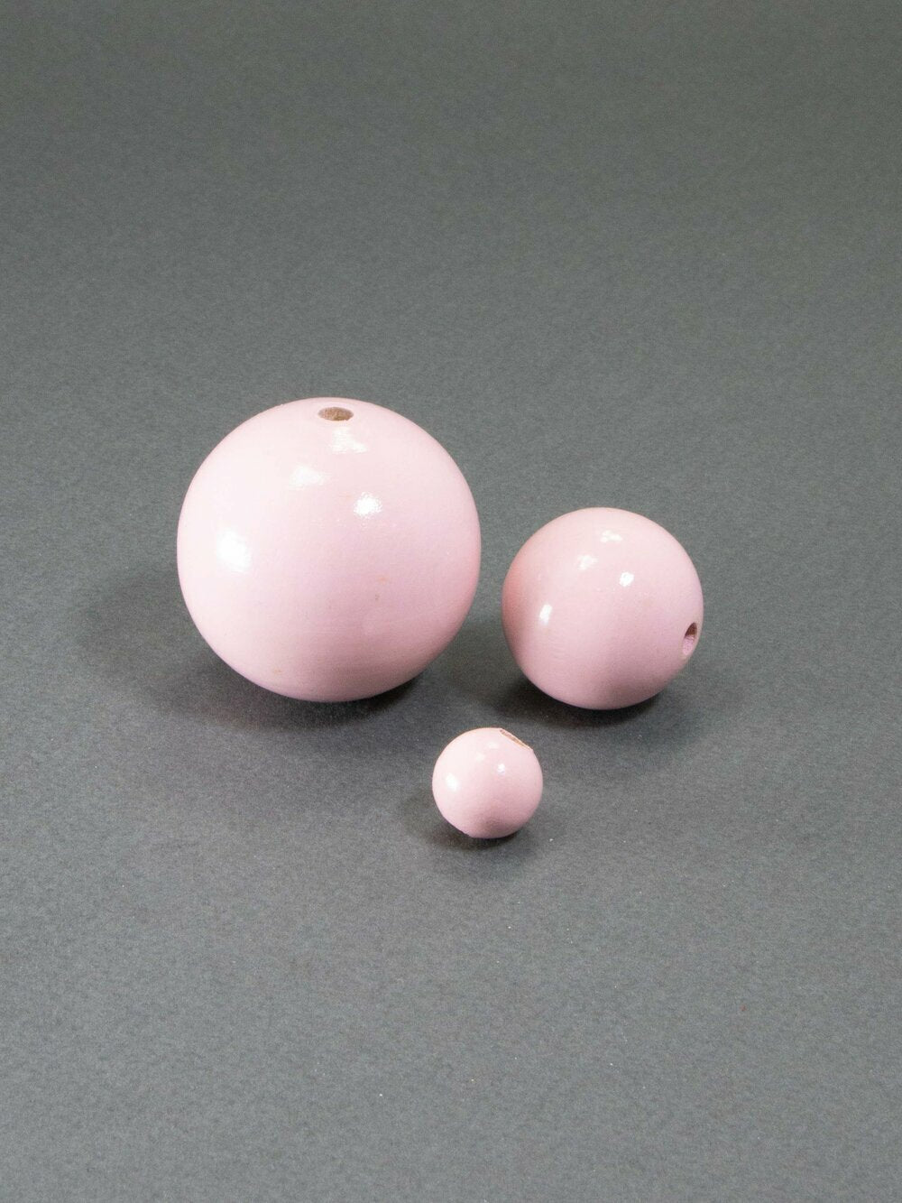 Perlina di legno rosa chiaro