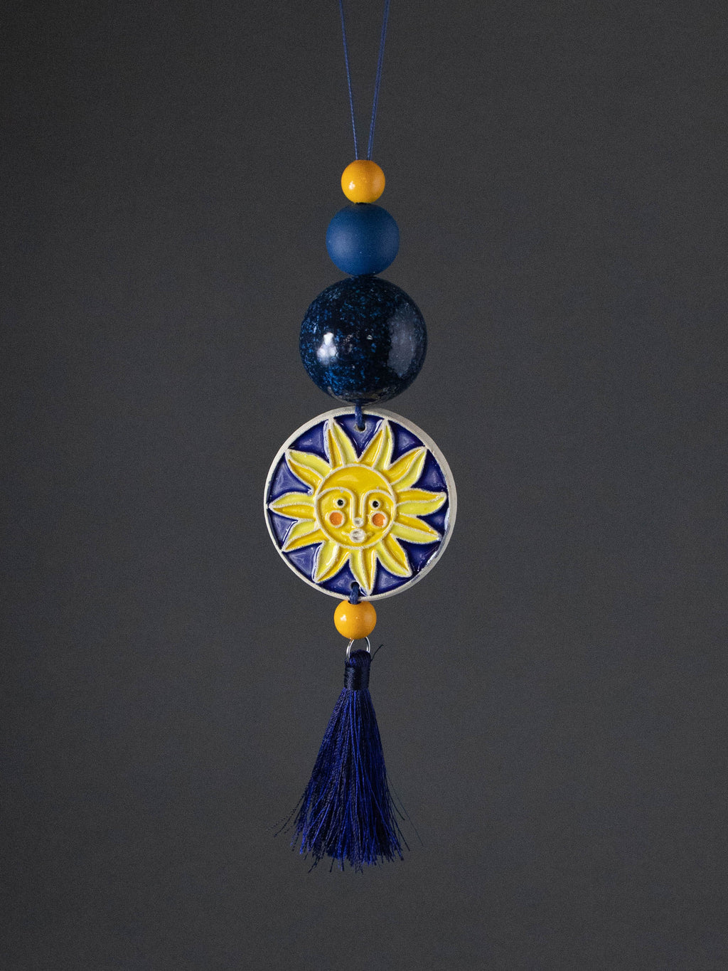 Ciondolo con perline sole