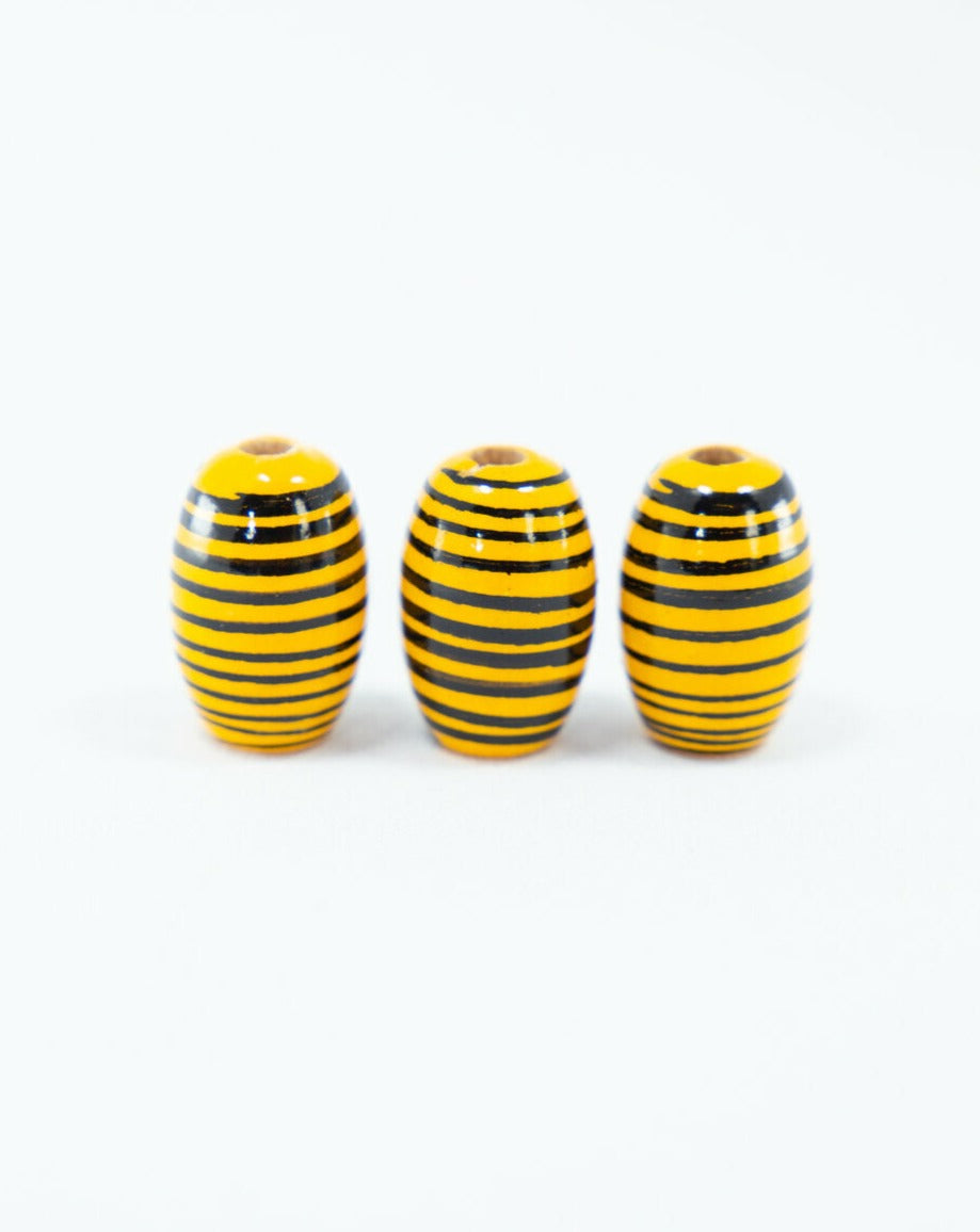 Perline di legno a strisce gialle a forma di fagiolo
